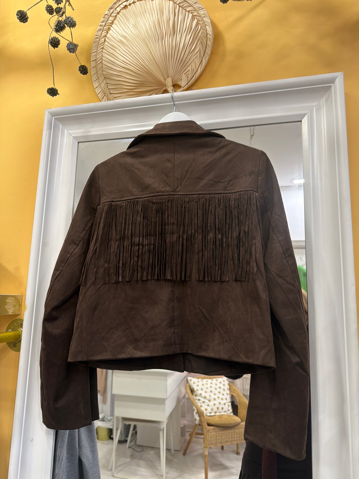 Chaqueta corta flecos